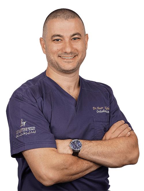 دكتور عامر نحاس - افضل طبيب تقويم أسنان في دبي