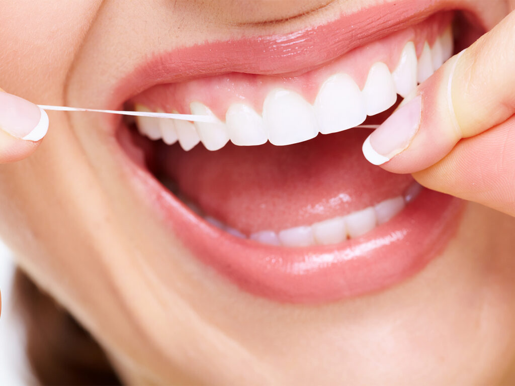 healty-teeth-flossing-best-dental-clinic-in-dubai